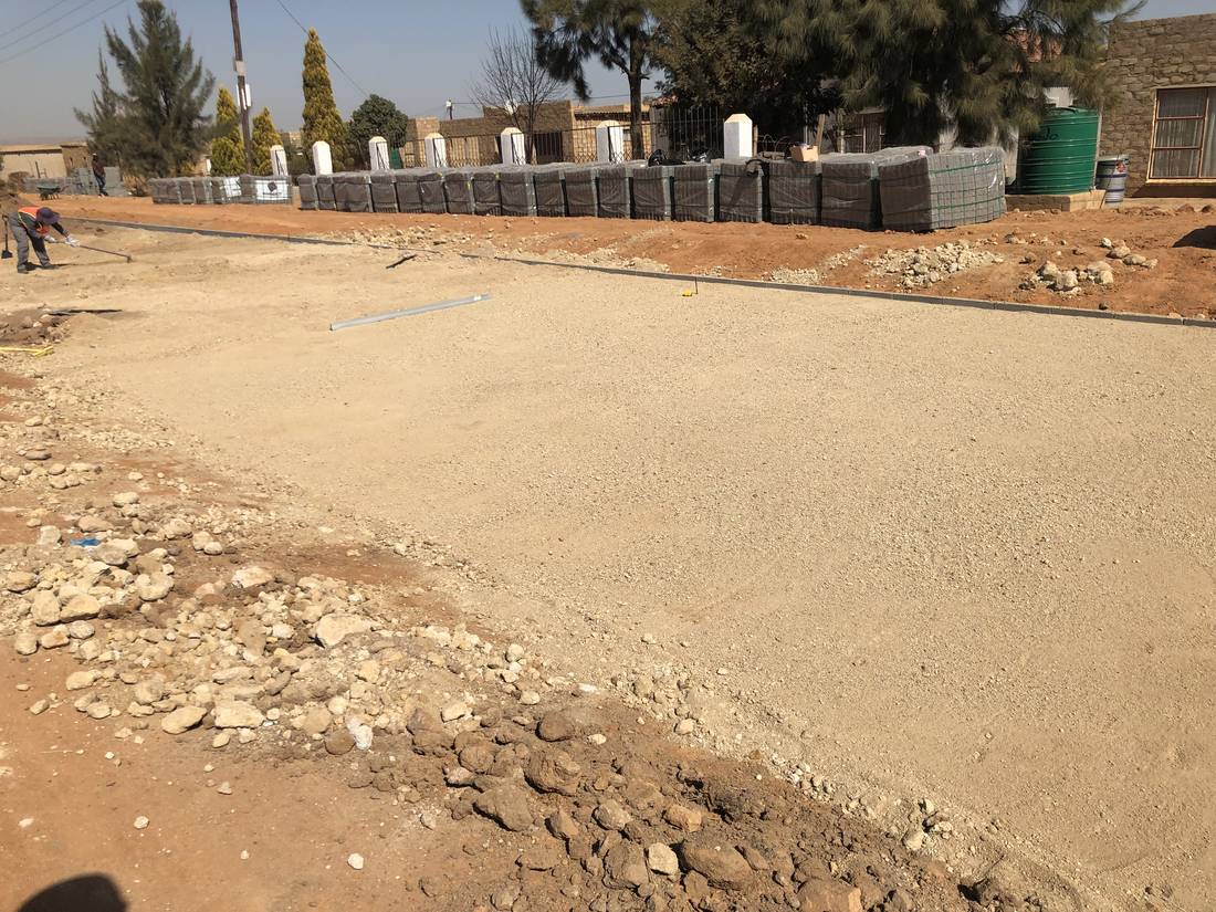 Prepared subbase with kerbs and pavers