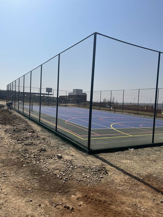 Completed multipurpose courts and fencing