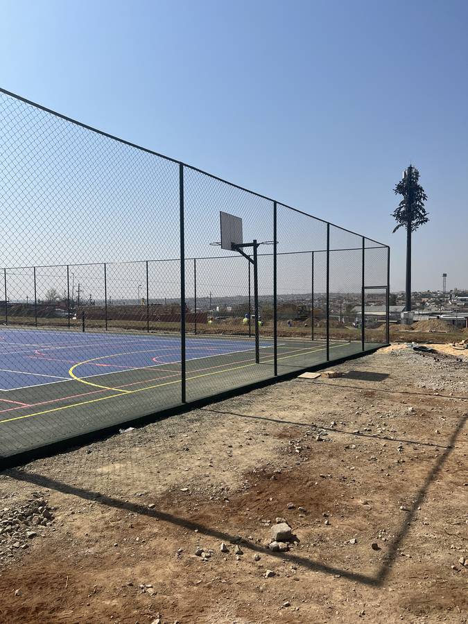 Court fencing and basketball goal