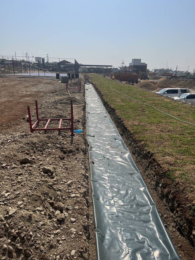 Lined stormwater channel under construction