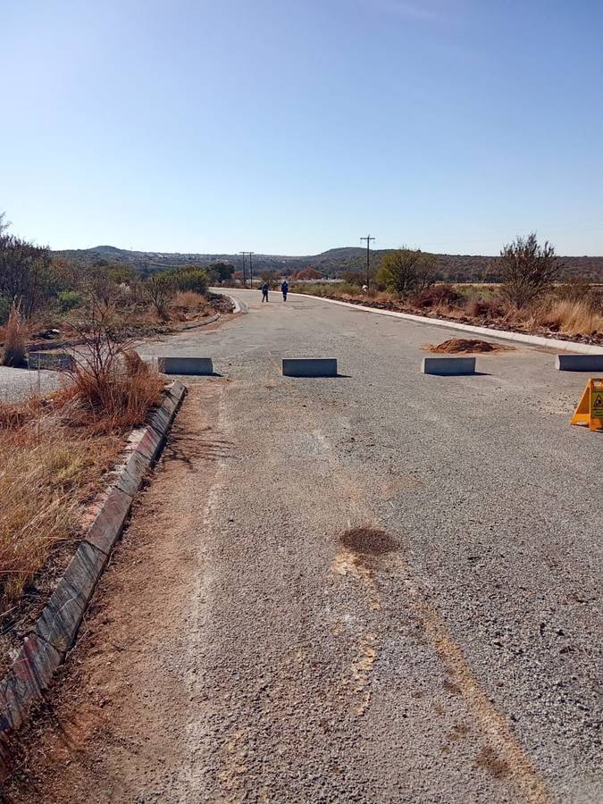 Concrete barriers across the carriageway